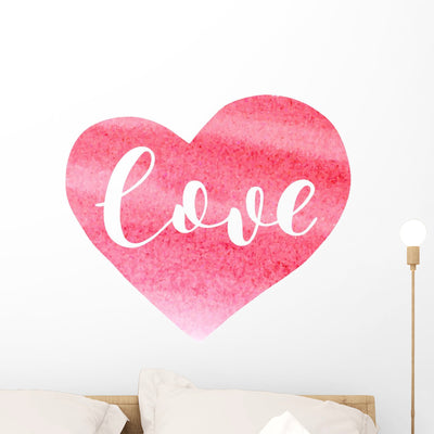 Brush Lettering Love Wall Decal shown on a wall