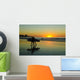 Surfers at sunset Wall Mural