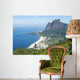 Scenic skyline view from above Sao Conrado Beach with Pedra da Gavea mountain and the favela community of Rocinha in Rio de Janeiro, Brazil Wall Mural