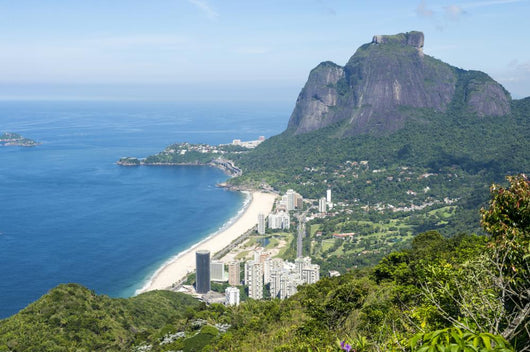 Scenic skyline view from above Sao Conrado Beach with Pedra da Gavea mountain and the favela community of Rocinha in Rio de Janeiro, Brazil Wall Mural