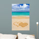 Drawing connected hearts on beach Wall Mural