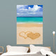 Drawing connected hearts on beach Wall Mural