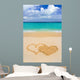 Drawing connected hearts on beach Wall Mural