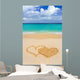Drawing connected hearts on beach Wall Mural