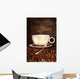 White coffee cup with spoon on roasted beans Wall Mural