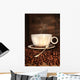 White coffee cup with spoon on roasted beans Wall Mural