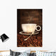 White coffee cup with spoon on roasted beans Wall Mural