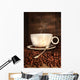 White coffee cup with spoon on roasted beans Wall Mural