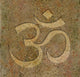 Om Symbol Engraved on Stone Wall Mural