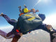 Skydiving instructor pov of student Wall Mural