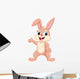 Cute rabbit cartoon waving hand Wall Decal