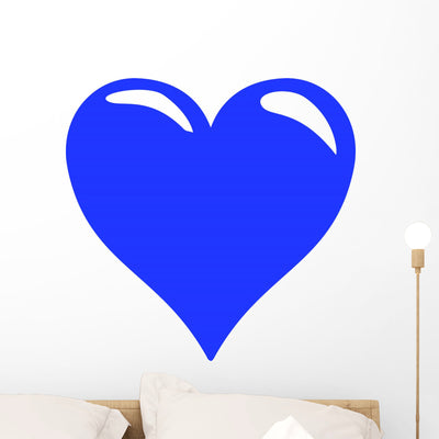 Shining Blue Heart Wall Decal shown on a wall