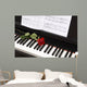 sheet music with rose on piano Wall Mural