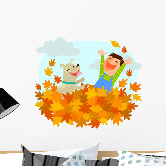 Boy and his dog playing in a pile of autumn leaves Wall Decal