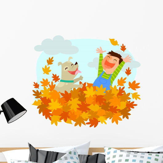 Boy and his dog playing in a pile of autumn leaves Wall Decal