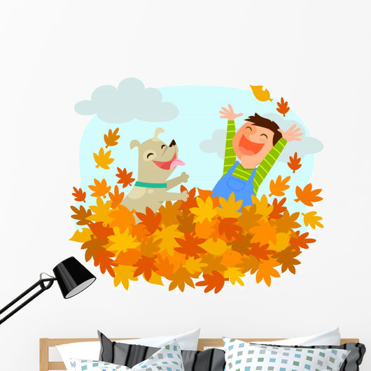 Boy and his dog playing in a pile of autumn leaves Wall Decal