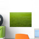 Green grass texture of a soccer field. Wall Mural