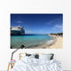Cruise ship docked in tropical island beach port Wall Mural