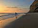  Surfer walking on the beach at sunset, Black's Beach, La Jolla, California, USA Wall Mural