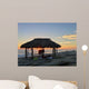 Silhouette of women under a beach shack in La Jolla, California.  Wall Mural