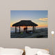 Silhouette of women under a beach shack in La Jolla, California.  Wall Mural