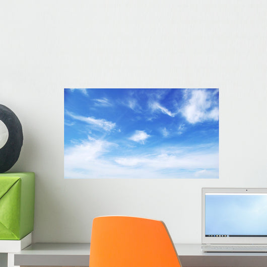 Blue sky background with tiny clouds Wall Mural