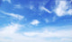 Blue sky background with tiny clouds Wall Mural