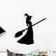 Young witch with a broom silhouette Wall Decal