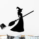 Young witch with a broom silhouette Wall Decal