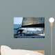 sailboat with a whale splash in background Wall Mural