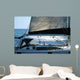 sailboat with a whale splash in background Wall Mural