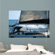 sailboat with a whale splash in background Wall Mural