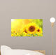 Sunflowers on blurred sunny background Wall Mural