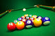 Billiard Balls on Green Cloth Wall Mural