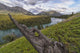The Takhini River flows through a valley near Kusawa Lake Wall Mural