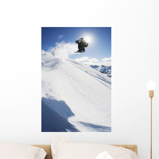 Professional Snowboarder Making Jump Wall Decal