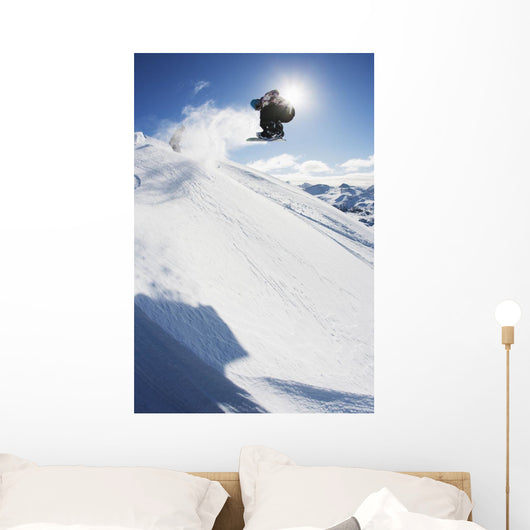 Professional Snowboarder Making Jump Wall Decal