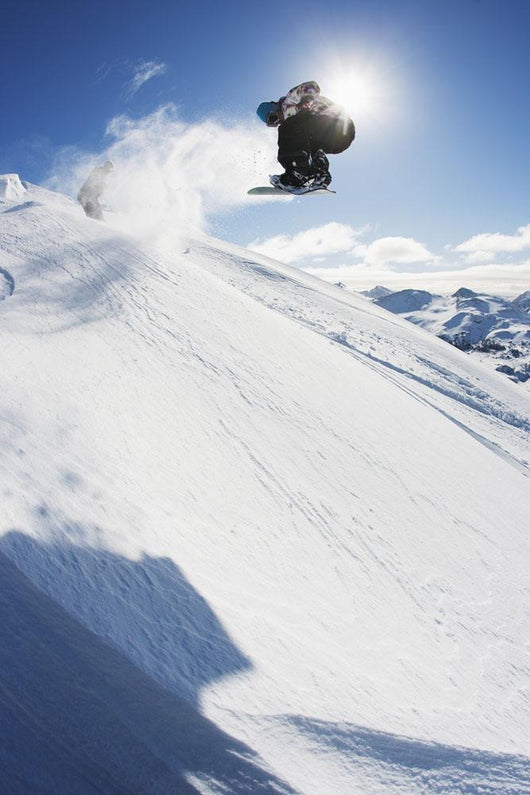 Professional Snowboarder Making Jump Wall Decal