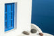 Whitewash Building with Blue Wall Decal