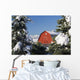 Snow covered red barn, evergreens, mountains Wall Mural