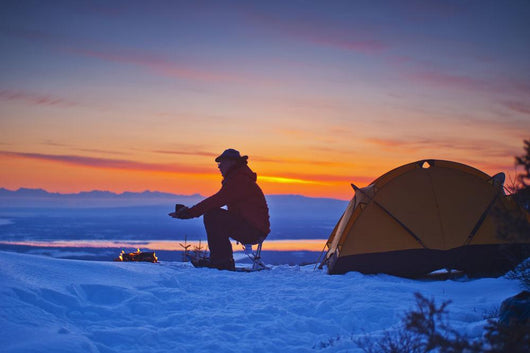 Backpacker Warms His Hands Wall Decal
