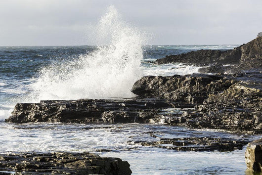 Wave Crashing into Rocky Wall Decal