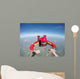 Skydiving senior man holding hands Wall Mural
