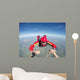 Skydiving senior man holding hands Wall Mural