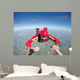 Skydiving senior man holding hands Wall Mural