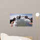A group of friends holding hands teamwork skydiving Wall Mural