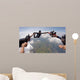 A group of friends holding hands teamwork skydiving Wall Mural
