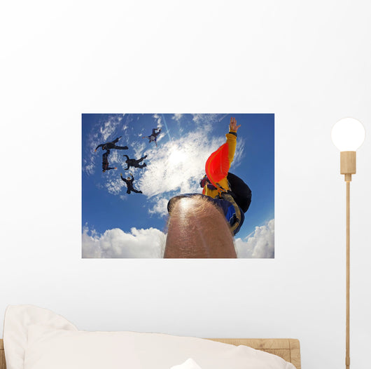 Point of view of a camera attached in the leg of the skydiver Wall Mural