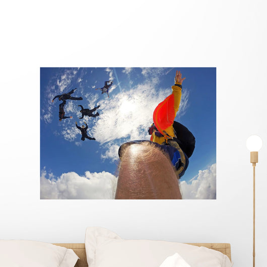 Point of view of a camera attached in the leg of the skydiver Wall Mural