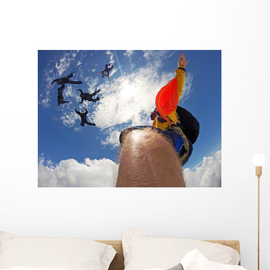 Point of view of a camera attached in the leg of the skydiver Wall Mural